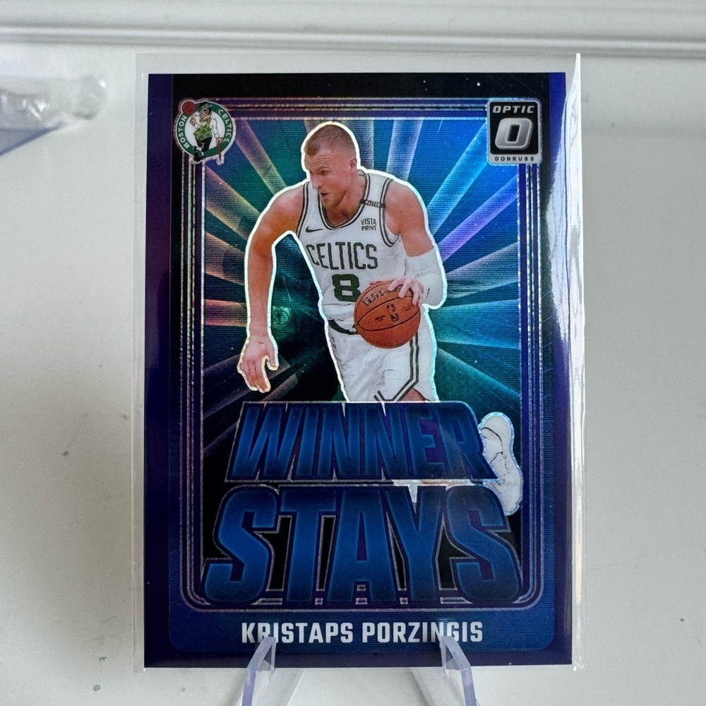 2024 2025 Panini Donruss Optic Prizm Kristaps Porzingis Winner Stays Card. Mint
